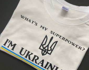 What’s My Superpower? I’m Ukrainian!! (Flag) Zelenskyy emblem T Shirt colour white - sizes S M L - fruit of Loom original quality shirts.