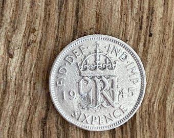 1945 Lucky Silver Sixpence George VI Good Condition grade F12 Sealed Capsule. UK coin Hunters