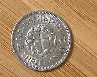 1941 silver Threepence coin. King George VI. Almost BUNC. Grade AU60. Sealed capsule. UK Coin Hunters.