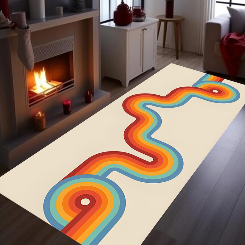 May include: A rectangular rug with a cream-colored background and a retro design. The design features a wavy, colorful pattern in shades of red, orange, yellow, blue, and green. The rug is placed on a dark wooden floor.