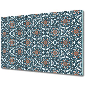 May include: A seamless pattern with a teal background and white and orange floral designs. The pattern is made up of repeating geometric shapes.