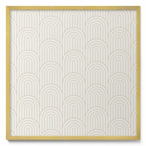 May include: A framed art print featuring a repeating pattern of arched shapes in gold against a white background. The frame is a simple, gold-colored square. The design has a retro, art deco feel.
