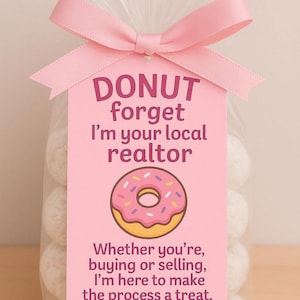 May include: A clear cellophane bag tied with a pink ribbon and tag. The tag reads "DONUT forget I'm your local realtor" with a donut graphic. The text below says "Whether you're, buying or selling, I'm here to make the process a treat. Erica."