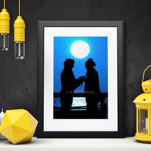 May include: A framed print of a digital painting depicting two silhouettes of people standing on a pier at night. The sky is a vibrant blue with a large, white moon. The text "9 BLACK POPPIES" is visible at the bottom of the image.