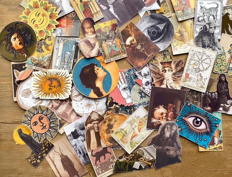 May include: A collection of colorful tarot card stickers featuring various designs, including a sun, an eye, a skull, and a wheel of fortune. The stickers are printed on white paper and have a glossy finish.