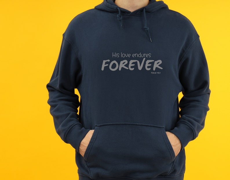 May include: Navy blue hooded sweatshirt with the text "His love endures FOREVER Psalm 136:1" printed on the front.