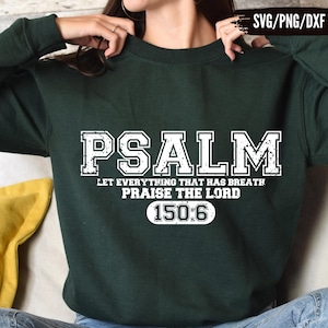 May include: Dark green sweatshirt with the word "PSALM" in large white letters. Below the word "PSALM" is the text "LET EVERYTHING THAT HAS BREATH PRAISE THE LORD 150:6". The sweatshirt is a comfortable, casual style.