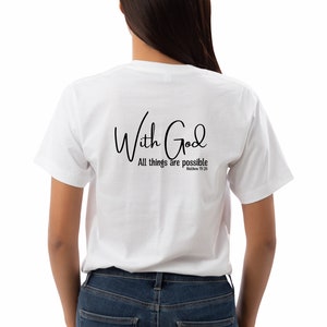 May include: White t-shirt with black text that reads "With God All things are possible Matthew 19:26".