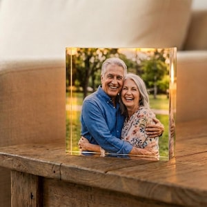 May include: A rustic wooden sign with the text "Welcome to our home" in white lettering. The sign features a distressed finish and a simple, inviting design, perfect for a front porch or entryway.