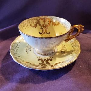 Yellow with gold leaf Vintage Teacup & Saucer