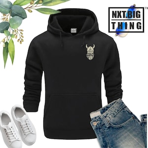 May include: Black hooded sweatshirt with a white graphic of a viking helmet and beard with the word "DAD!" on it.
