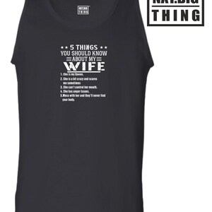 May include: Black tank top with white text that reads "5 THINGS YOU SHOULD KNOW ABOUT MY WIFE." The text lists five humorous statements about a wife. The tank top also has the "NXT.BIG THING" logo.