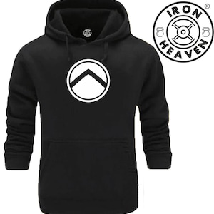 Peut inclure: Sweat-shirt à capuche noir avec un logo de bouclier spartiate blanc et le texte "IRON HEAVEN" dans un cercle avec une icône de poids de chaque côté.
