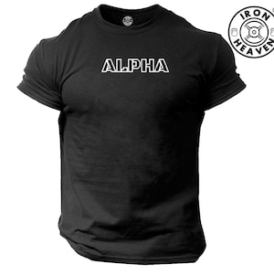 May include: Black t-shirt with white text that reads "ALPHA" in a bold, outlined font.