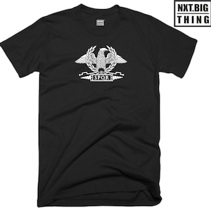 May include: Black t-shirt with a white graphic of a Roman eagle with the text "SPQR" underneath.
