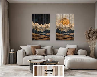 May include: Two wooden wall art panels depicting mountain landscapes. One features a dark blue sky and the other a golden sun. The artwork is made of wooden planks in shades of brown, beige, and blue. The text "wood wall art" is at the bottom.