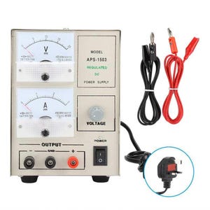 May include: A white and grey power supply unit with a voltage knob, a power switch, and two analogue meters. The unit has a black power cord and two red and black alligator clips. The unit is labelled "APS-1503" and "REGULATED DC POWER SUPPLY".