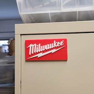 Milwaukee Logo badge for boxes cabinets screw-on or magnetic