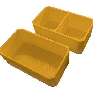 May include: Two yellow plastic storage containers with lids. The container on the left is open and the container on the right is closed.