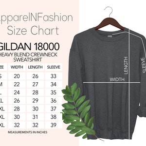 May include: Size chart for Gildan 18000 heavy blend crewneck sweatshirt. The chart shows measurements in inches for width, length, and sleeve length for sizes S through 4XL.