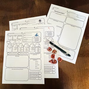 May include: A blank character sheet for a tabletop role-playing game, with sections for character name, class, race, ability scores, skills, and inventory. There are also sections for death saves, currency, and spellcasting abilities. The sheet is printed on white paper and is surrounded by dice and a pen.