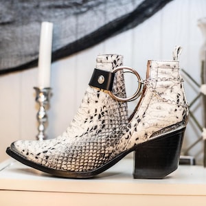 the OUTLAW v2 collection: vegan leather boot harnesses