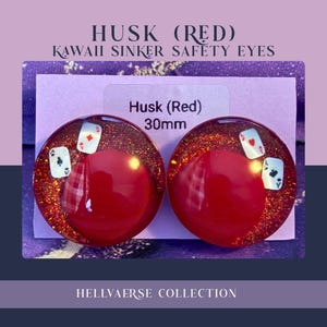 May include: Pair of red Husk earrings with a 30mm diameter, featuring playing card designs. The earrings have a glittery border and a large red center. Text on the image reads "Husk (Red)" and "HELLVAERSE COLLECTION."