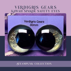 May include: Two 30mm steampunk-themed safety eyes with black pupils and gear details. The eyes are set against a purple background with the text "Verdigris Gears" and "Steampunk Collection".