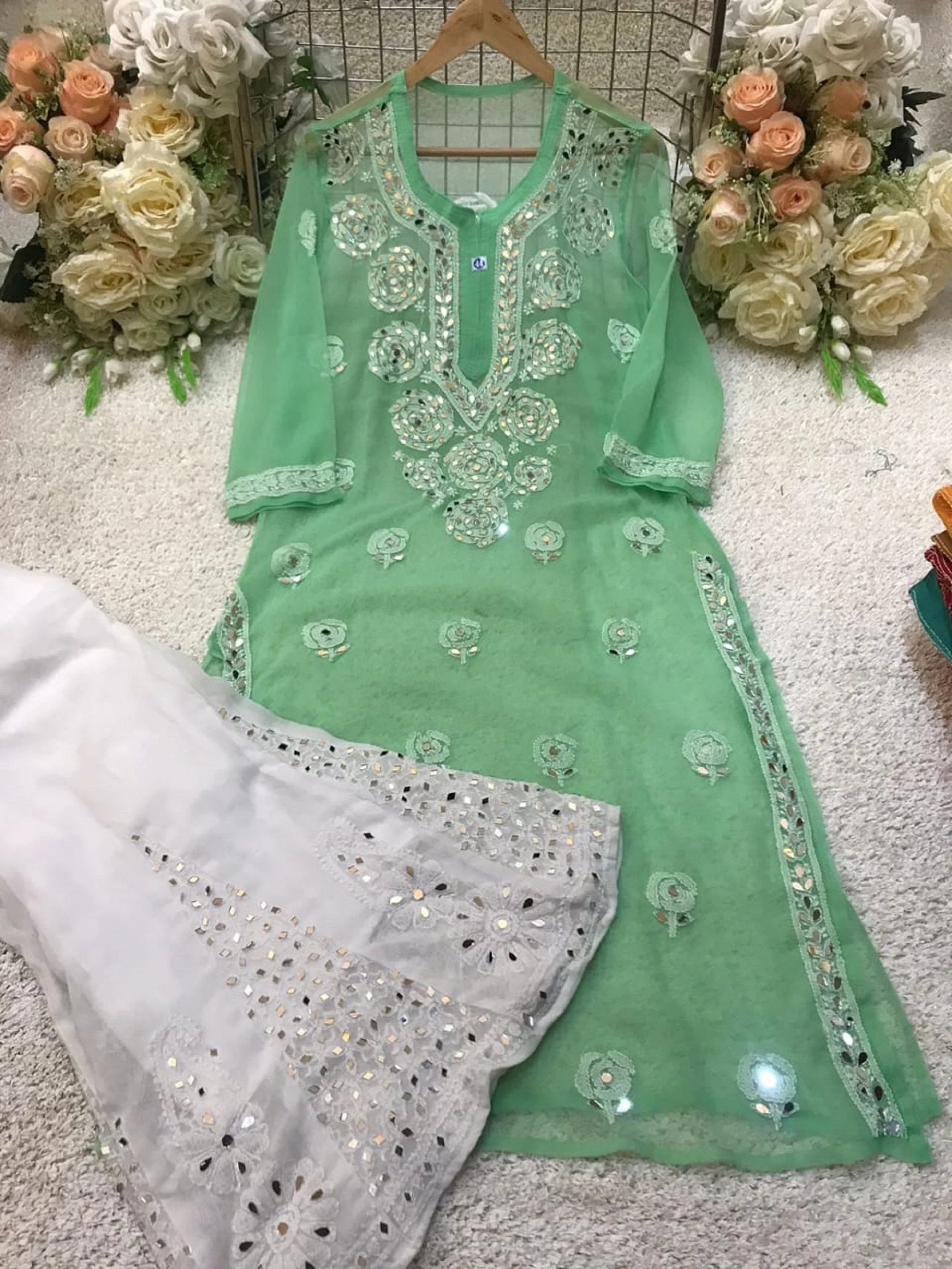 Hand Embroided chikan kurti with Glass work.