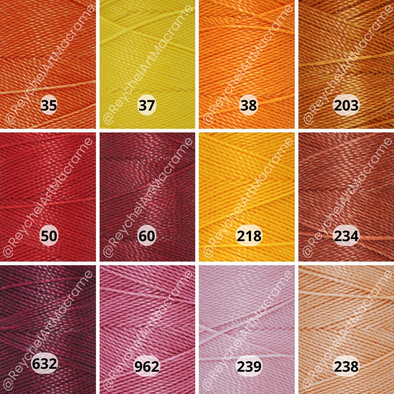 May include: Twelve spools of embroidery floss in various colors, including orange, yellow, red, brown, pink, and peach. The spools are labeled with numbers: 35, 37, 38, 50, 60, 218, 234, 632, 962, 239, 238, and 203.