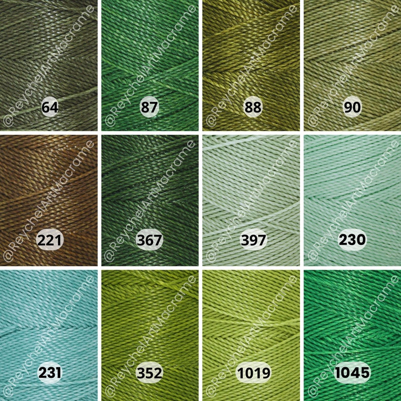 May include: A collection of 10 spools of embroidery floss in shades of green, brown, and blue. The spools are labeled with numbers 64, 87, 88, 90, 221, 367, 397, 230, 352, 1019, and 1045.