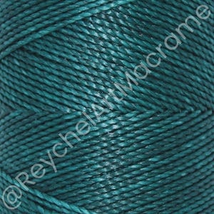 May include: Teal blue macrame cord, a twisted, textured string for crafting.