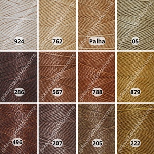 May include: A close-up view of 12 spools of cord in various shades of brown, beige, and tan. The spools are labeled with numbers, including 924, 762, Palha, 05, 286, 567, 788, 879, 496, 207, 205, and 222.