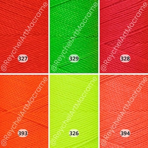 May include: Six spools of neon colored cord, three red and three green. The spools are labeled with numbers 327, 328, 329, 326, 393, and 394.  @ReychelArtMacrame is printed on each spool.