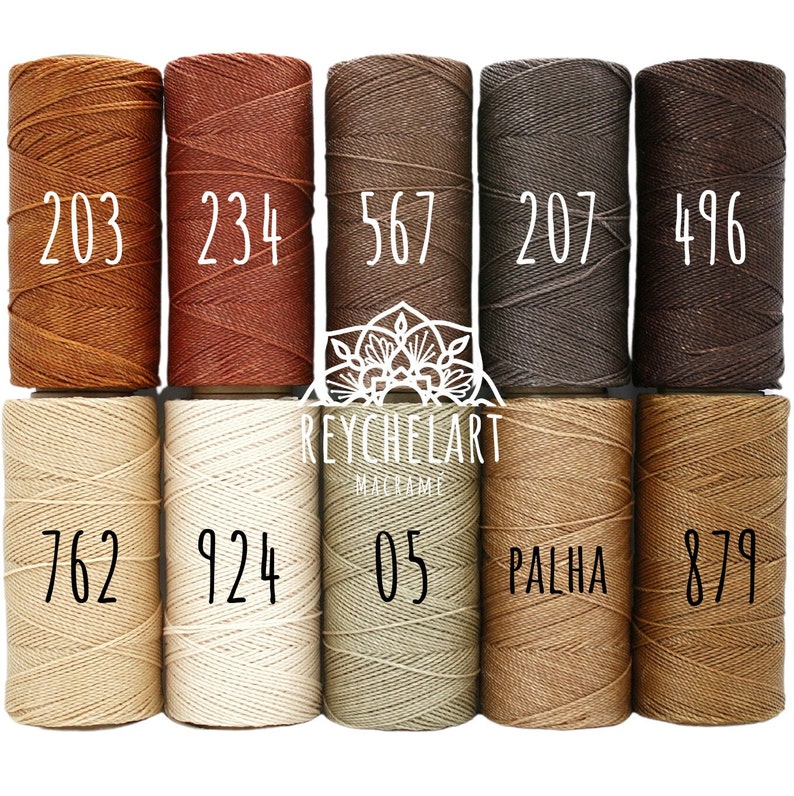 May include: Ten spools of cord in various shades of brown, beige, and cream. The spools are labeled with numbers: 203, 234, 567, 207, 496, 762, 924, 05, PALHA, and 879.