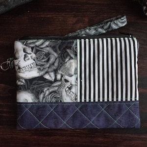Cartera de mano con cremallera