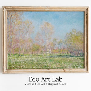 May include: A framed painting depicting a landscape with trees and a blue sky. The trees are in the foreground and are a light pink colour. The sky is a light blue colour. The painting is in a wooden frame.