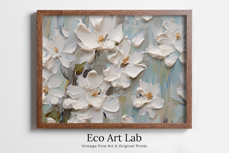 A textured painting of white flowers with a wooden frame, displayed above the text “Eco Art Lab Vintage Fine Art & Original Prints