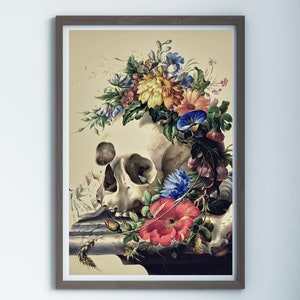May include: A human skull with a crown of colorful flowers, including yellow, red, blue, and white blooms. The skull is resting on a piece of fabric with a wheat stalk.