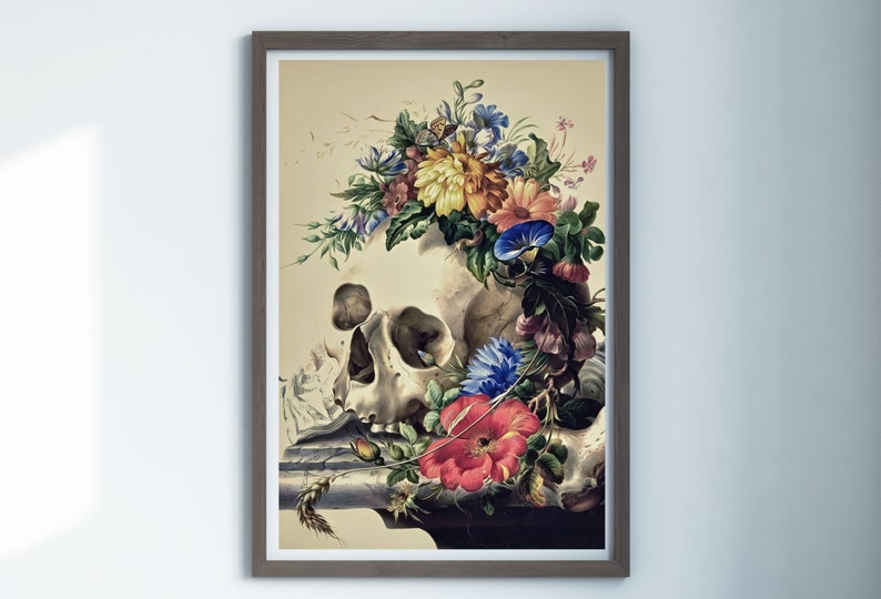 May include: A human skull with a crown of colorful flowers, including yellow, red, blue, and white blooms. The skull is resting on a piece of fabric with a wheat stalk.