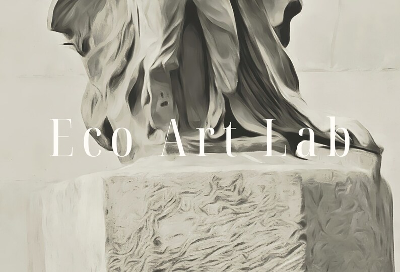 May include: A close-up of a white stone sculpture with the text "Eco Art Lab" in front of it.