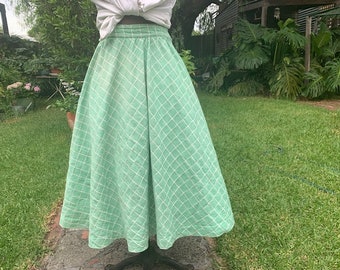 Full circle cotton skirt in light green with white stitching