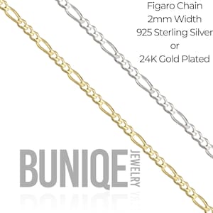 Pu&ograve; includere: Due catene Figaro con una larghezza di 2 mm, una in argento sterling 925 e una in metallo placcato oro 24K. Il testo recita: Figaro Chain, 2mm Width, 925 Sterling Silver or 24K Gold Plated, con il marchio BUNIQE JEWELRY visibile.
