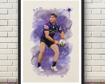 May include: A framed art print featuring a watercolor-style illustration of a rugby player in a purple and yellow jersey holding a ball. The player wears dark shorts and socks, with the text #9 Harry Grant visible near the bottom right corner.