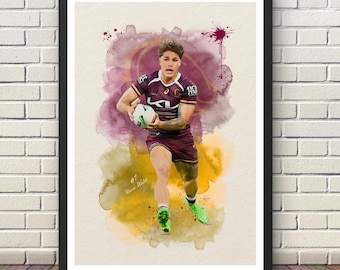 May include: A framed art print featuring a watercolor-style illustration of a rugby player in a maroon and gold jersey holding a ball. The player wears bright green cleats and is positioned against a background of maroon and yellow paint splashes.