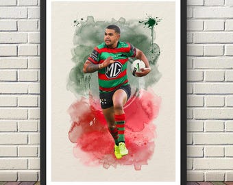 May include: A framed watercolor print of a rugby player in a red, green, and white jersey, holding a rugby ball. The artwork features a watercolor background with red and green splashes. The player is wearing black shorts and yellow shoes. The number 1 is visible.