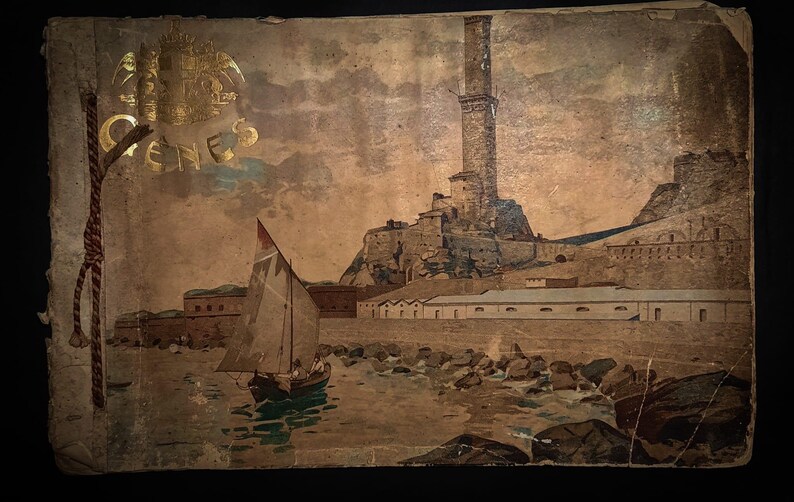 May include: A vintage postcard depicting a seaside town with a tall tower and a sailboat in the foreground. The postcard is faded and has a gold seal with the word "GENES" on it.