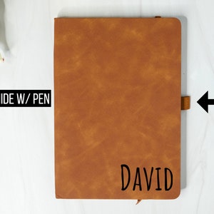 May include: A brown leather-bound journal with a pen loop and the name "DAVID" embossed on the front.