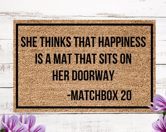 She thinks that happiness is a mat that sits on her doorway, matchbox 20 doormat, 90s gift, I love the 90s gift,  doormat for 90's kid