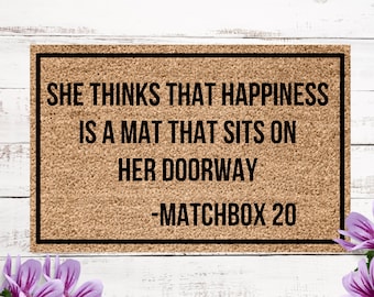 She thinks that happiness is a mat that sits on her doorway, matchbox 20 doormat, 90s gift, I love the 90s gift,  doormat for 90's kid